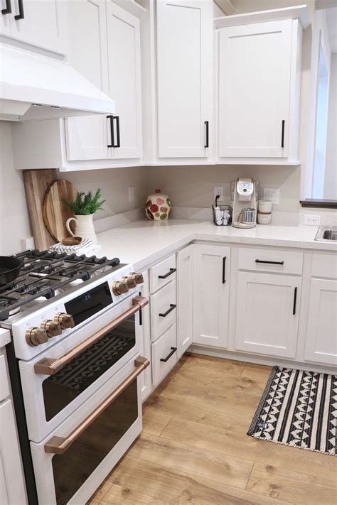 white cabinets with appliances pictures